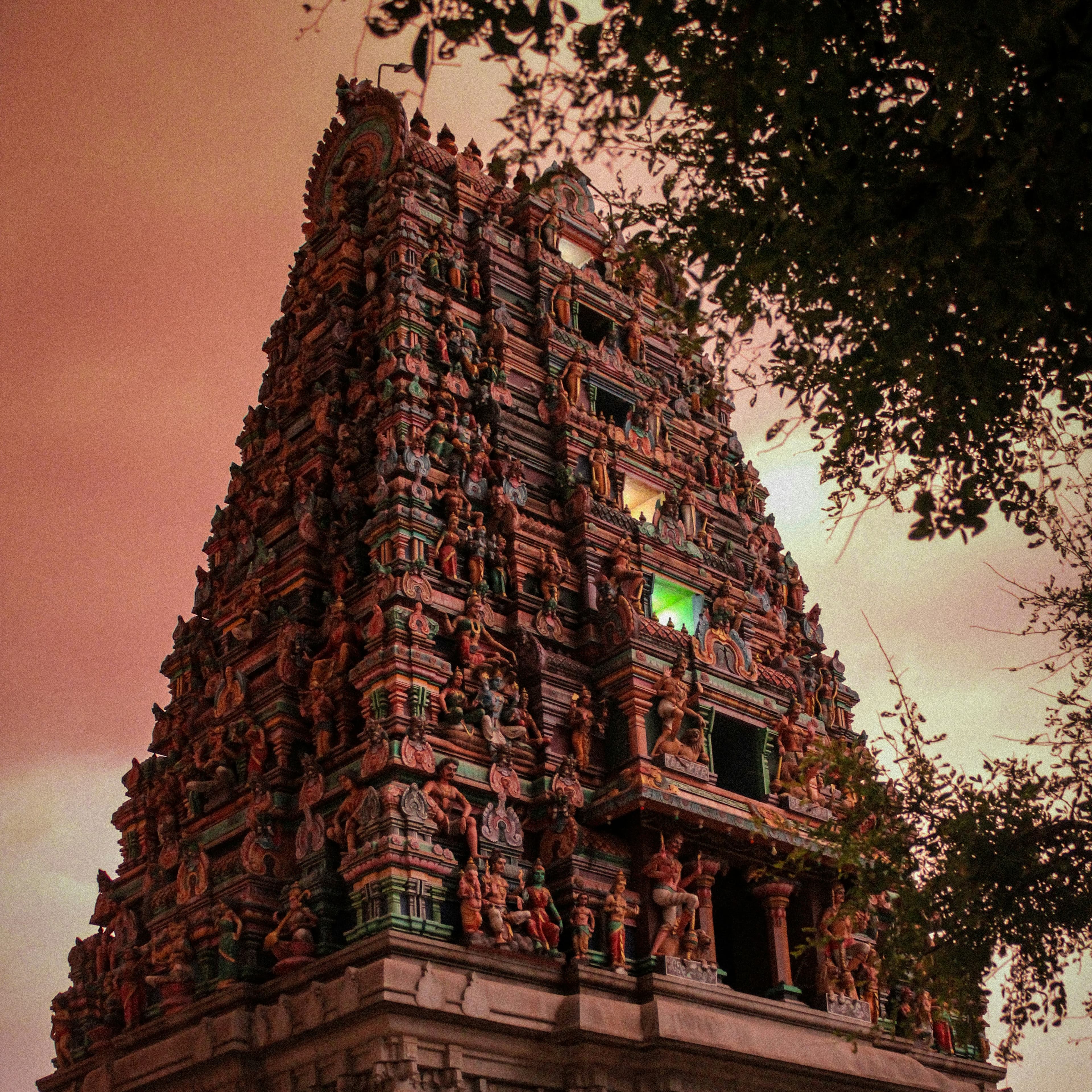 Ornate Dravidian temple gopuram at dusk, Karnataka